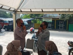 Polsek Baros Polresta Serkot Himbau Untuk Mematuhi Prokes Menggunakan Masker Kepada Nasabah Bank Bjb